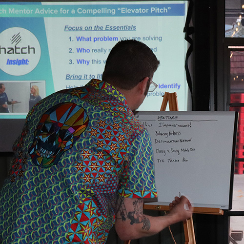 Scott Wolfson signing up to pitch at Pitch Party Sylva, July 17, 2025