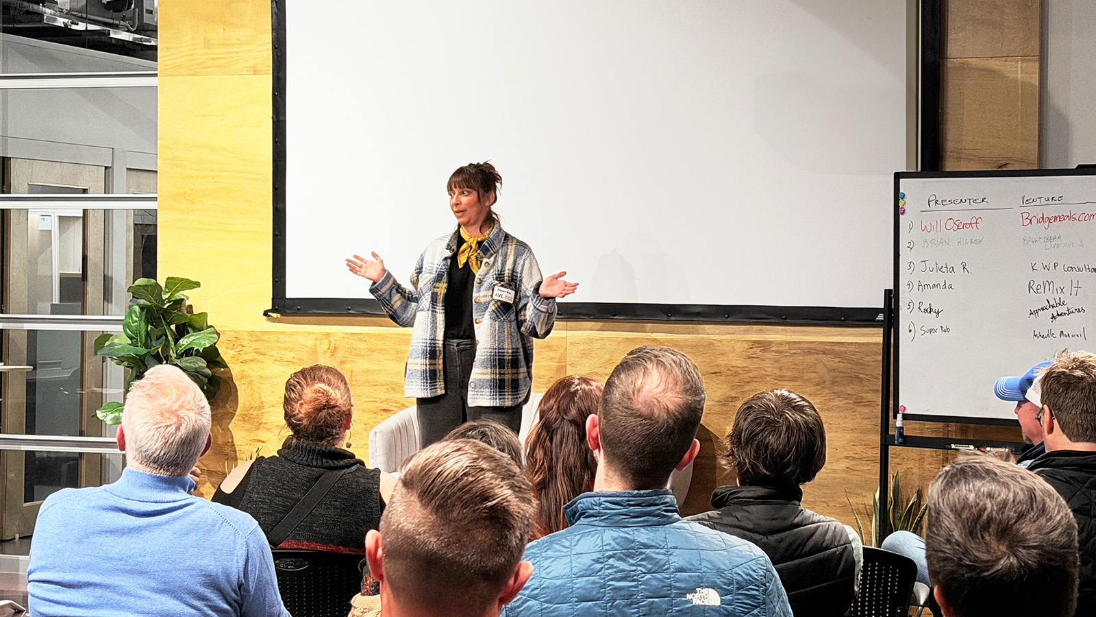 Amanda Wiled of ReMix it on stage at PItchgiving 2025, Asheville